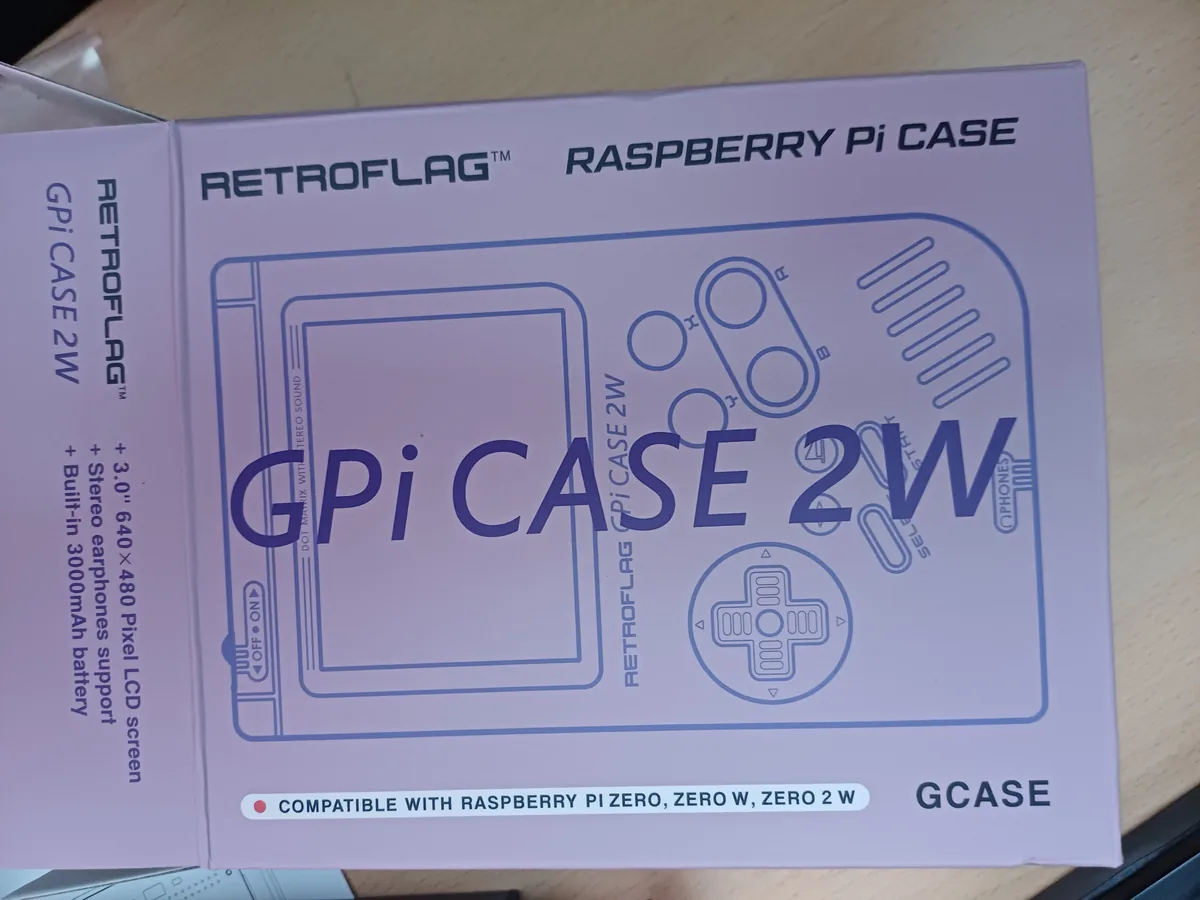 The Retroflag GPi Case 2W packaging and its compatible Raspberry Pi Zero models